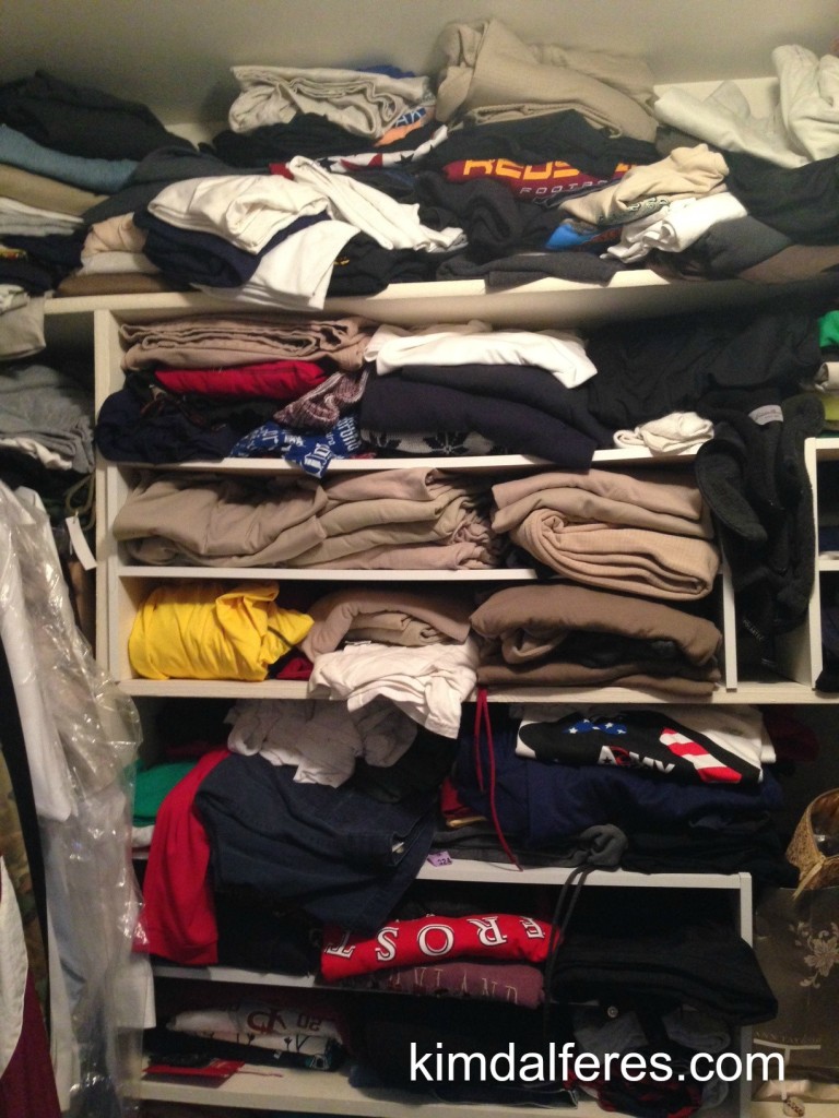 t-shirts in the closet with text